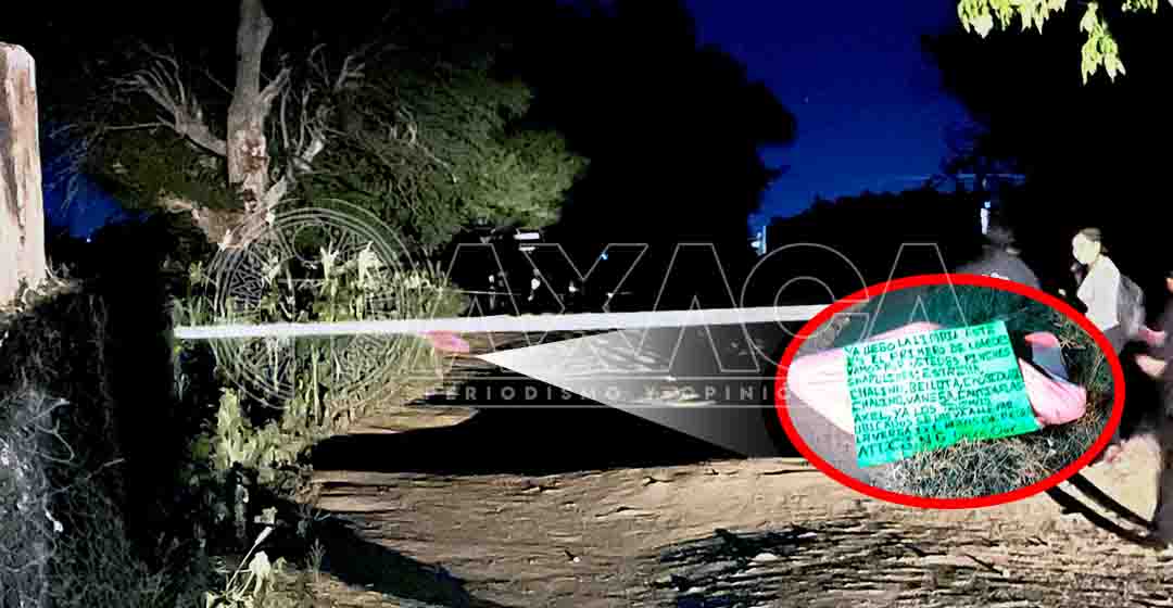 VIDEO y FOTO: Encobijado y con mensaje amenazante hallan cuerpo en carretera a Zaachila, Oaxaca